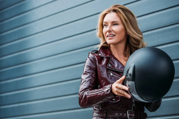 Attractive Woman Leather Jacket Holding Motorcycle Helmet Street Looking Away — стоковое фото