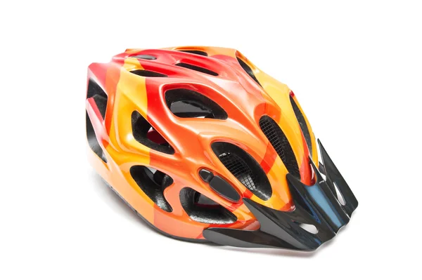 Оранжевый велосипедный шлем — стоковое фото
